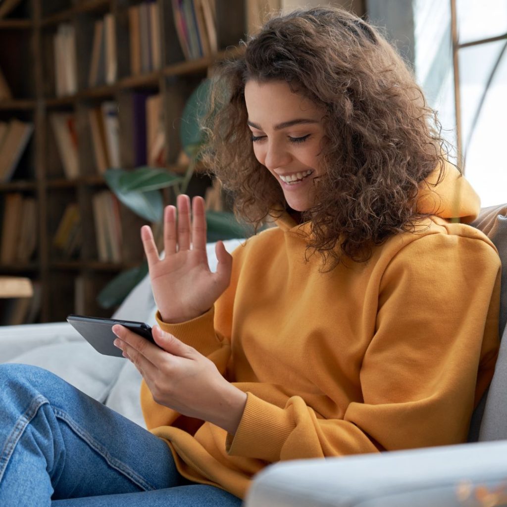 Woman video chatting with someone on the phone