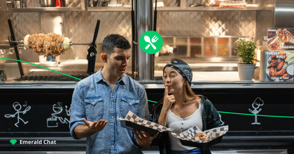 A man and a woman enjoying their foods