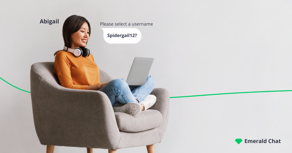 image of girl using laptop and sitting on couch